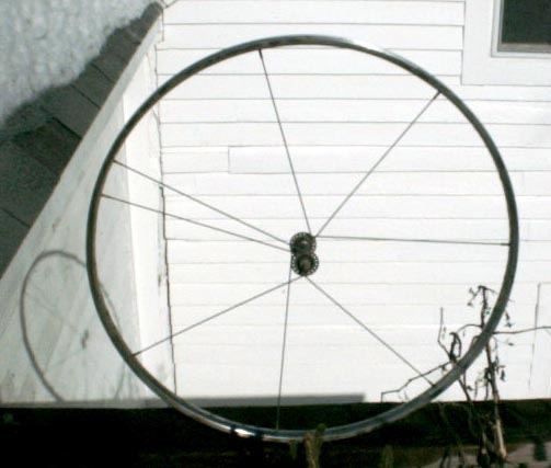 bicycle rim held together with eight spokes