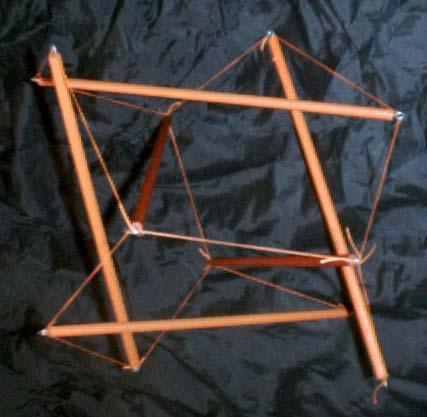 dowel-and-fishing-line augmented tensegrity two-fold prism study with four-fold girdle