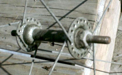 hub of bicycle wheel with eight spokes attached