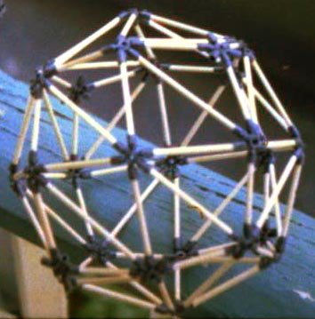 d-stix and eighth-inch dowel geodesic sitting on a porch railing