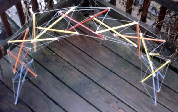 dowel-and-fishing-line two-fold eleven-layer tensegrity x-module arch with multi-colors