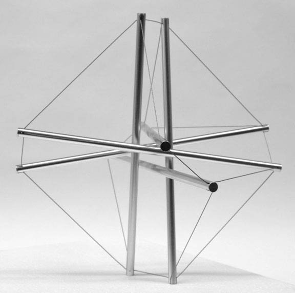 photo of steel and wire tensegrity tetrahedron